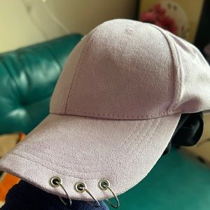 Hat with piercing details